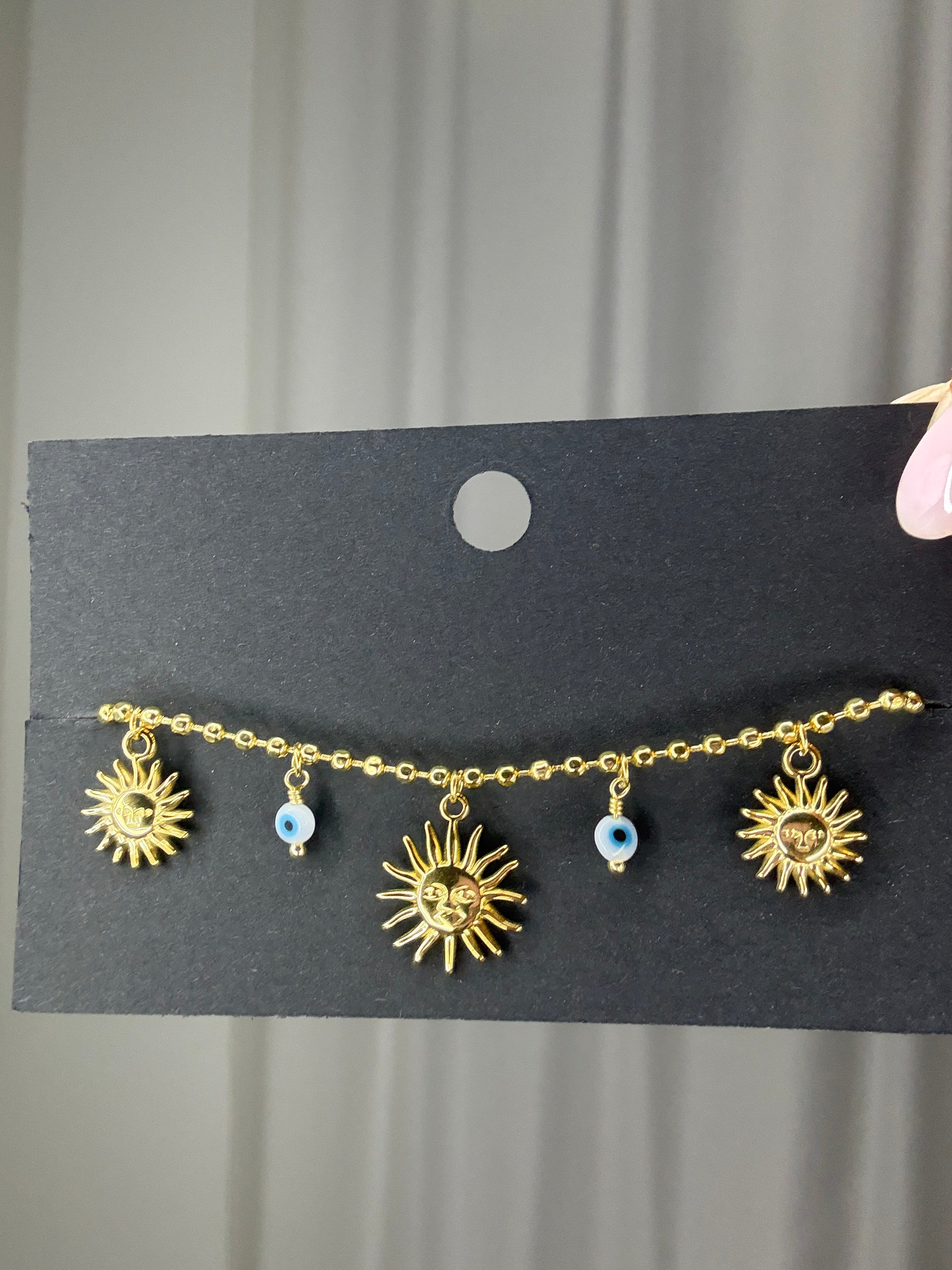 Goudkleurige armband zonnetjes