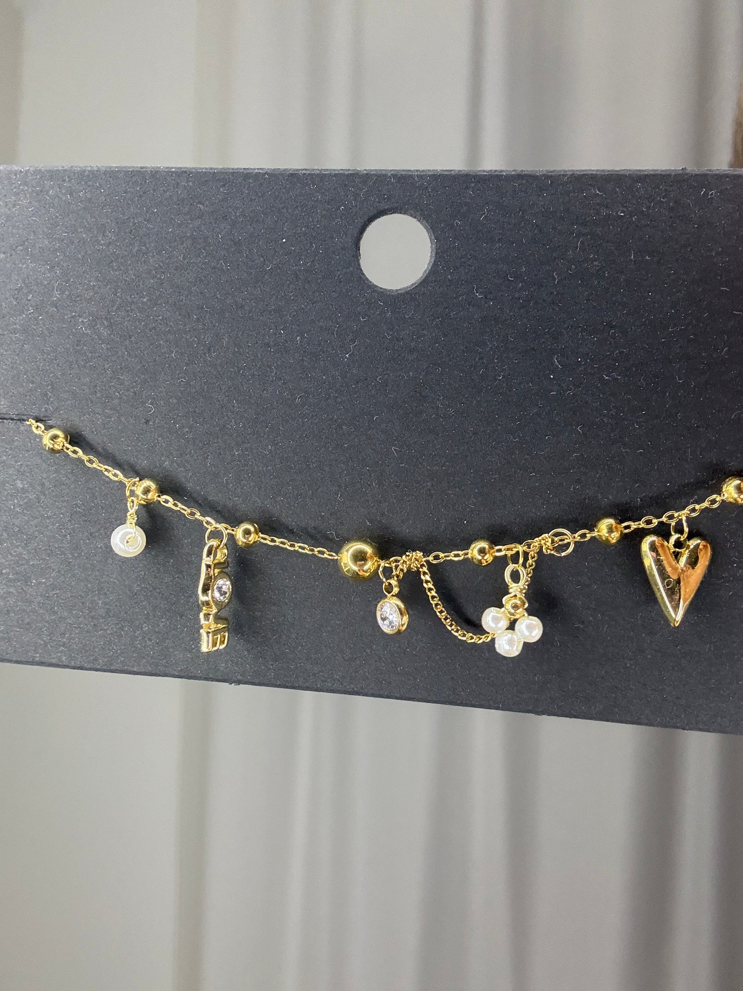 Goudkleurige armband love