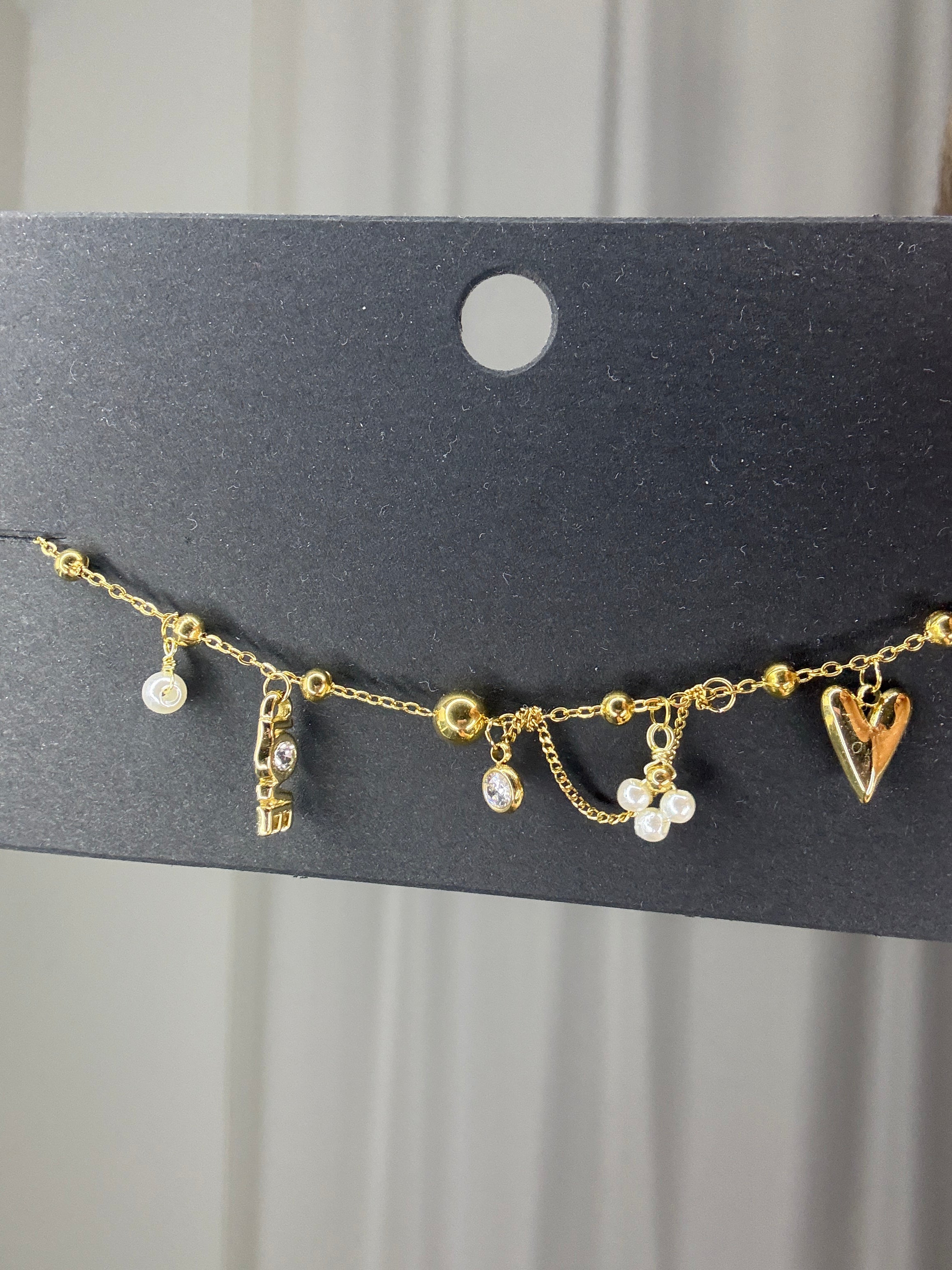 Goudkleurige armband love