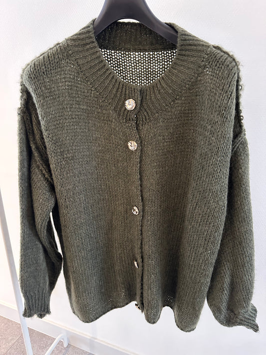 Groene vest met gouden knopen