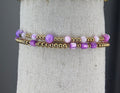 Armbandjes op rek met kralen paars en roze (set van 2 stuks)