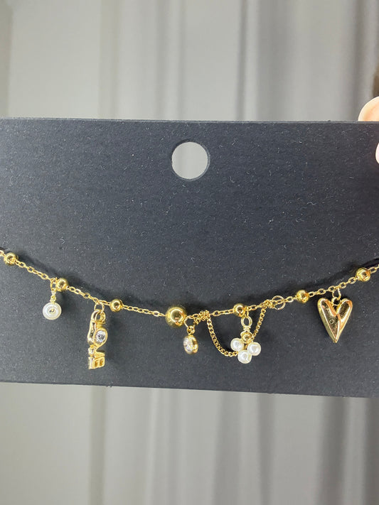Goudkleurige armband love